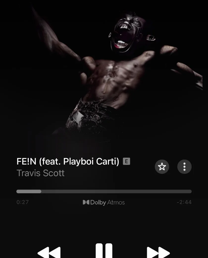Apple Music's Now Playing screen on Android, playing FE!N (feat. Playboi Carti) by Travis Scott